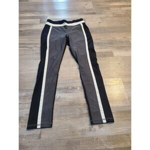 Stretchy, soft, yoga pants, size Medium, color block pattern.